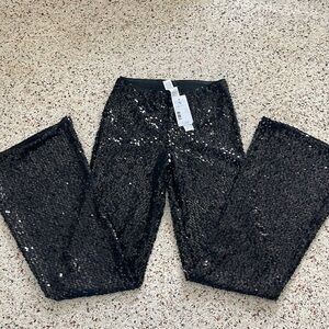 Calzedonia black sequin flare pants - NWT
